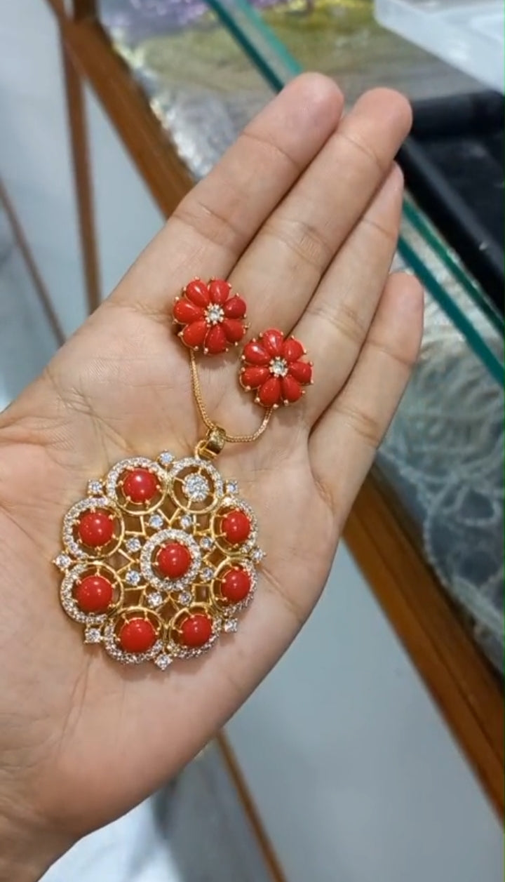 Beautiful coral stone premium gold plated big Pendant with plain chain necklace
and matching ear ringsCode : PCBS1 Jewel byjuwaan